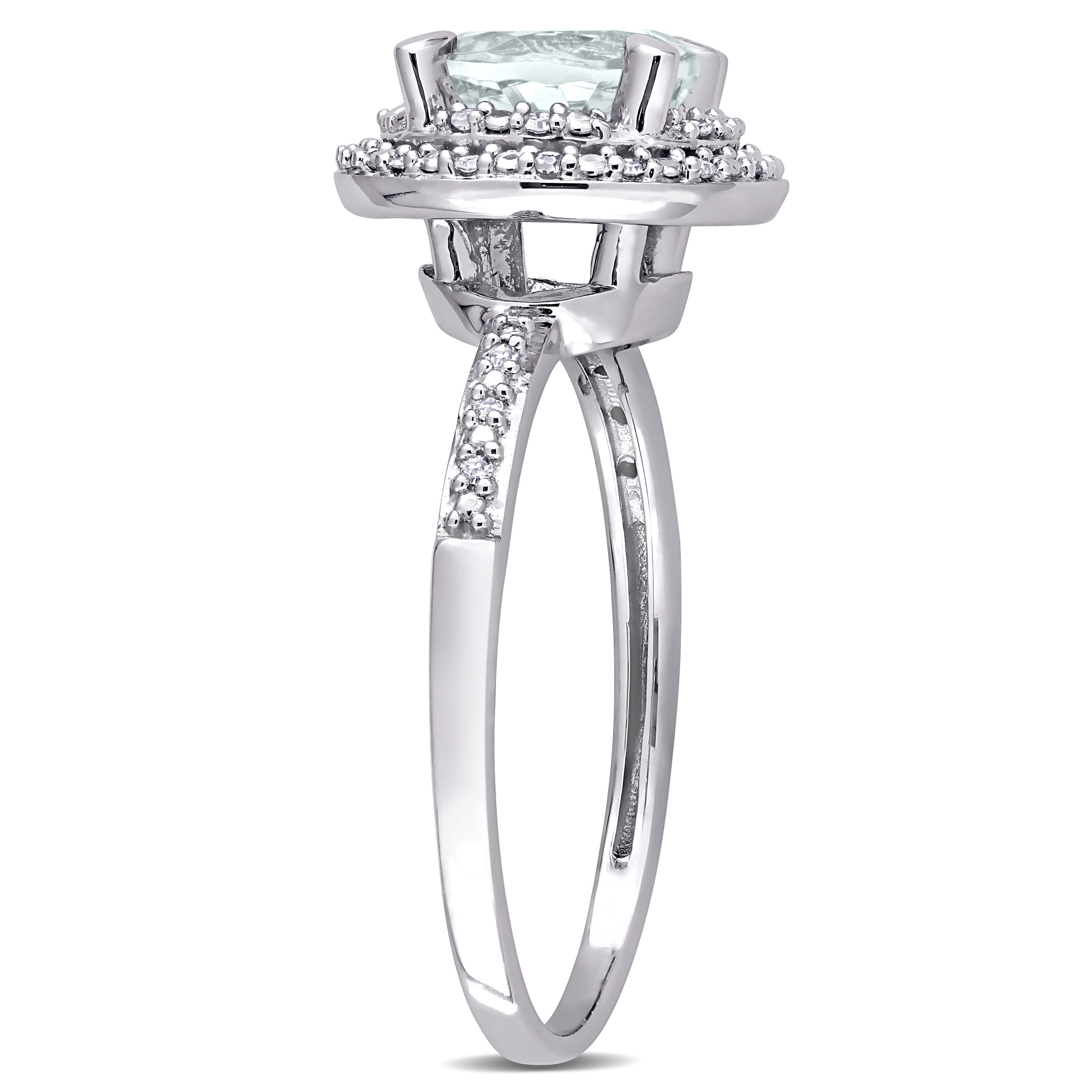 1 1/7 CT TGW Aquamarine and 1/10 CT TW Diamond Halo Engagement Ring in 10k White Gold