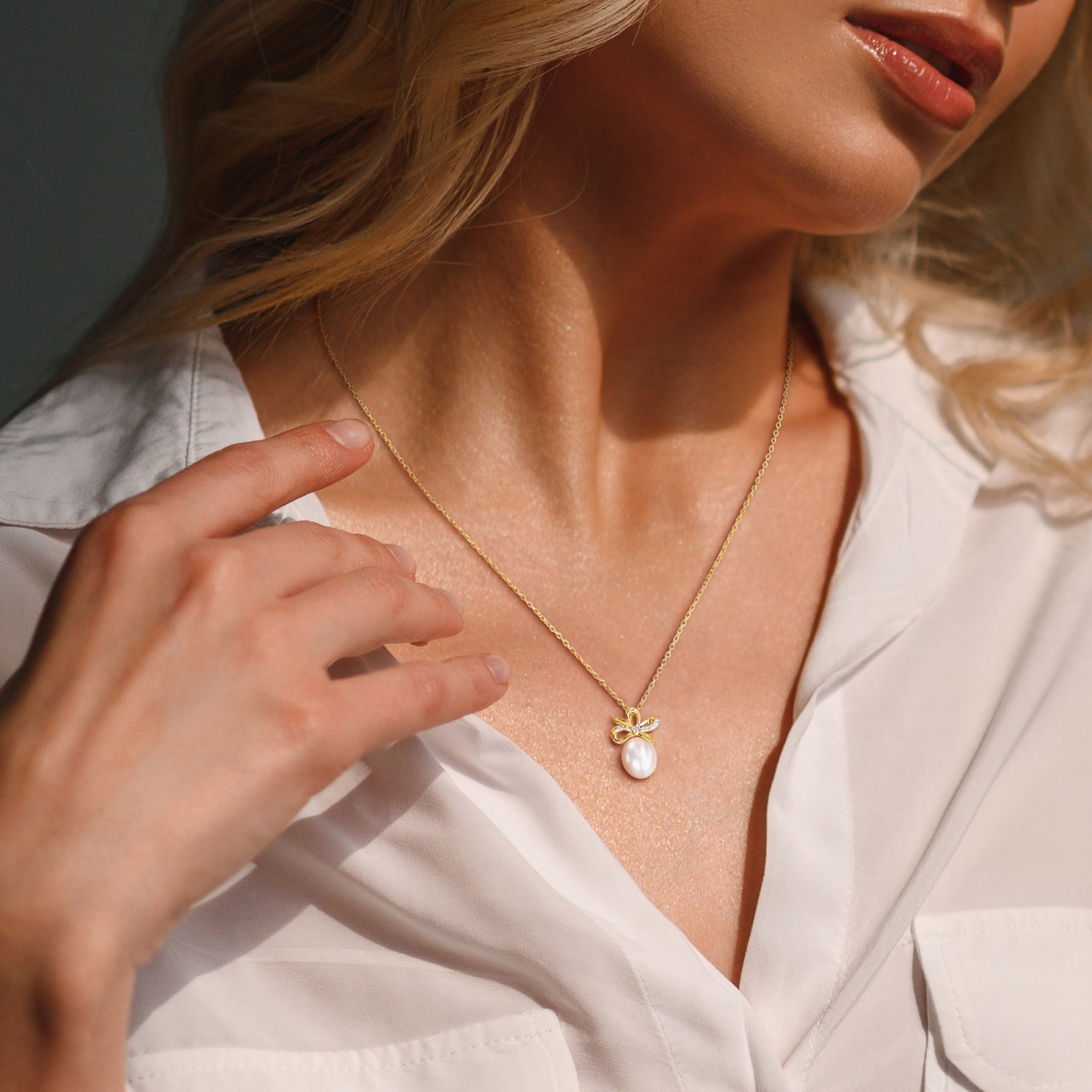 9-10mm Cultured Freshwater Pearl and 1/10ct TGW Created White Sapphire Bow Pendant with Chain in Two-Tone Sterling Silver - 18 in